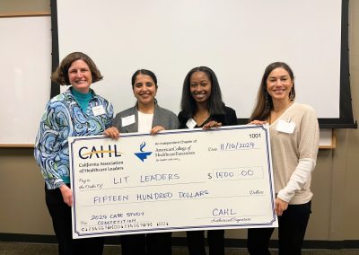Team Lit Leaders group photo with 1500 dollar giant check