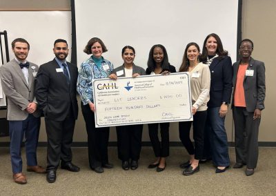 Team Lit Leaders group photo with 1500 dollar giant check