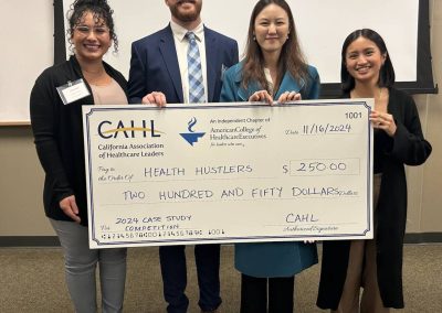 Health Hustlers team photo with 250 dollar giant check